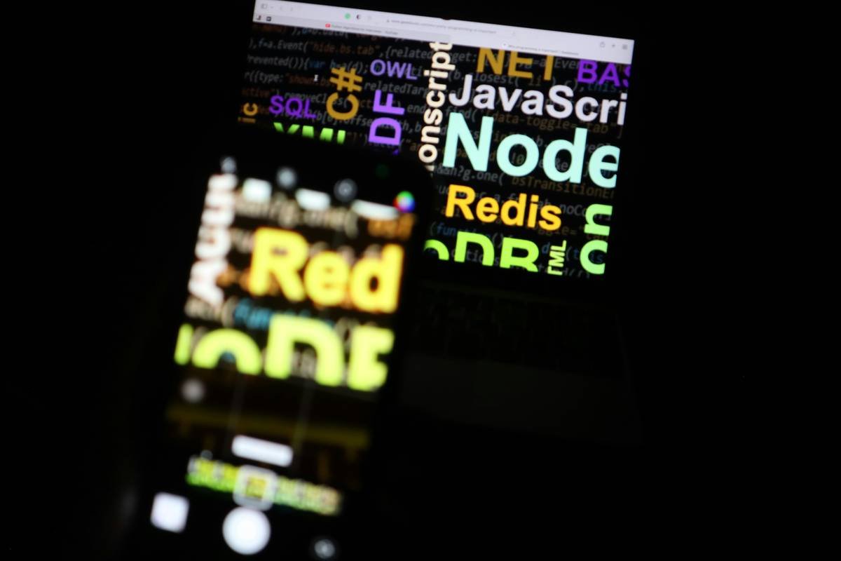 a close up of a cell phone in the dark